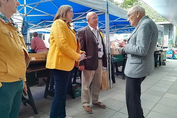 Talking to market goers in Portchester
